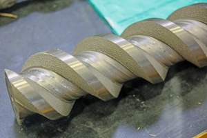  2 Förderschnecke mit aufgespritzter Verschleißschutz-BeschichtungScrew conveyor with sprayed-on anti-wear coating  