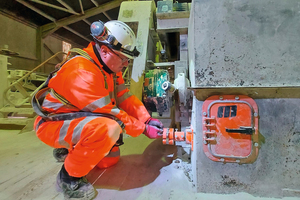  5	A Martin technician installs a remote monitoring sensor to track belt cleaner wear and tension 