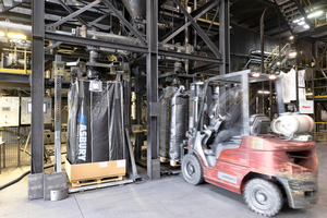  6	From the silo above, milled graphite continuously fills into a pair of bulk bag fillers 