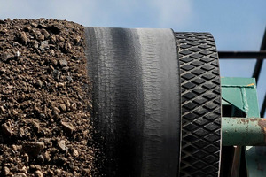  3	Close up of cracks: Pollution problems – fine particles of dust penetrate the cracks and are then discharged (shaken out) on the return (underside) run of the belt 