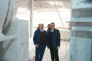  	Dietmar Alber and Naim Burghli next to the Super Orion ball mill 