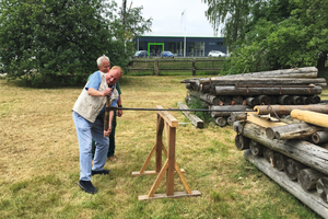  6 Klaus Hofmann and one of the visitors drilling pipes 