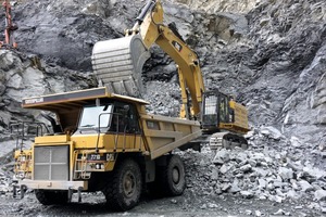  1 From a heap, the small truck is loaded, the backhoe excavator being able to operate with much smaller swing angles than the shovel version 