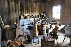  <div class="bildtext">11 Dietmar Hochmuth alias “Butter-Sepp” with historical implements for making butter, tallow and grease</div> 