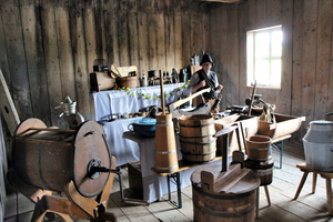  11 Dietmar Hochmuth alias “Butter-Sepp” with historical implements for making butter, tallow and grease 