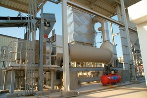  Typische Trommeltrockner-Anlage zur Trocknung und Kühlung von Quarzsand • Typical drum dryer for drying and cooling silica sand 