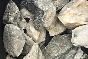  3 -100mm +35mm waste rock (lhs) and quartz reef (rhs)  