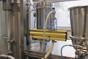  2	Optisizer Partikelgrößenmesssensor angeschlossen an einer Multiprozessanlage • Optisizer particle size measurement sensor connected to a multiprocessing plant 