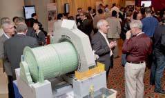  Participants during coffee break, model of mill and ring motor in the foreground 