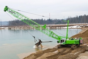  1	Im Kieswerk Wundschuh nahe Graz schürft ein SENNEBOGEN 6130 HD Seilbagger in Tiefen bis zu 13  m • In the Wundschuh gravel quarry near Graz a SENNEBOGEN 6130 HD duty cycle crawler crane trenches at depths to 13 m 